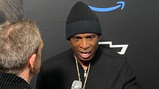 Deion Sanders talking to Mark McIntosh about mentoring youth